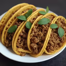 an arrangement of food is arranged on a plate