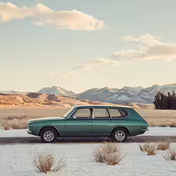 a green car on the side of a road