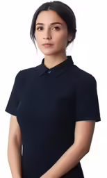 a woman in a black shirt and tan pants