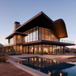 a very modern house by the water