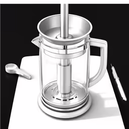 a blender is on a piece of paper near a pen