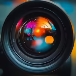 the lens has a lens cap up on it