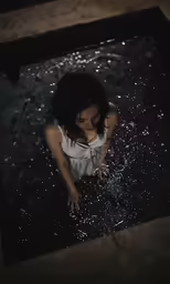 an attractive woman in white top on the water