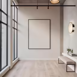 a modern living room with white walls and wooden floor