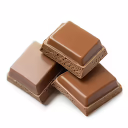 three chocolate and caramel slices stacked up