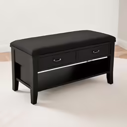 black bench with two drawers and a white background