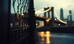 a view of a bridge through the fence