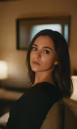 a woman looking at the camera with an intense look