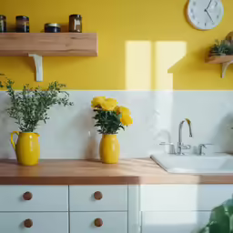 yellow vases on counter top in the kitchen