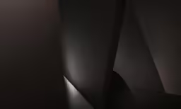 a black background with a very dark design
