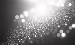 black and white photo of bubbles in the air