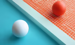 two eggs on an orange and blue background