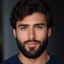 an image of a man with a beard posing for a picture