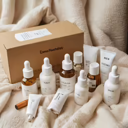 an assortment of bottles and the contents of an eos facialist