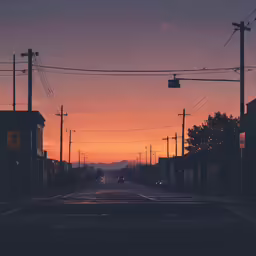 the sun is setting at an empty street