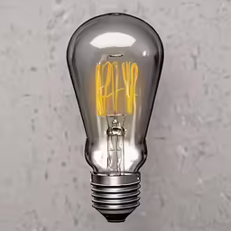 a light bulb with a yellow filament written on it