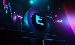 the electronic letter e is illuminated against dark