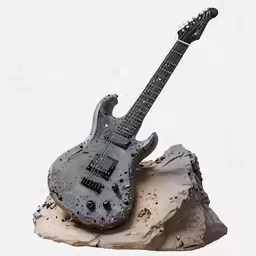 a guitar sits on top of a rock with a snowy background