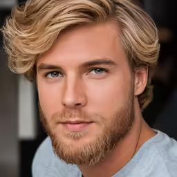 a man with blonde hair and a beard
