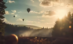 several hot air balloons in the sky