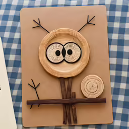 a book sitting on top of a table with a bird craft