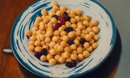 a blue and white plate topped with different kinds of food