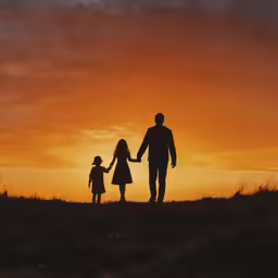 there is a family that is walking together