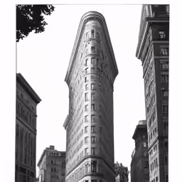 there is a tall building that has many windows