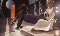a women is sitting down with her legs crossed