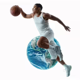 a basketball player on a globe with his arm out