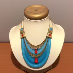 blue and red necklace sits on a white mannequin,a blue and red necklace sits on a display,there is a necklace made from beads and glass,a necklace that is sitting on a white mannequin,an elaborate necklace on a mannequin on a display