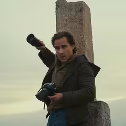 a man taking a selfie with a camera