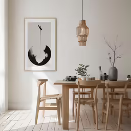 the wood tables in the room are decorated with an abstract artwork