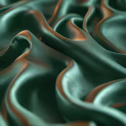 a close up picture of green and brown wavy material