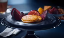 some fruits are on a tray of some sort