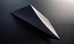 a very sharp knife on a shiny table