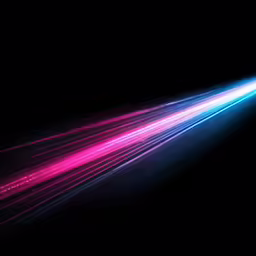 a large light streak on top of a black wall