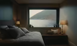there is a view of the water from the bedroom