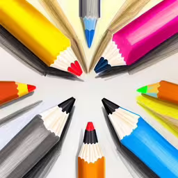 there are several colored pencils in the middle of a circle,many colored pencils arranged in the center of a circle,several colorful pencils with a white background,an image of colorful pencils arranged in a circle,an array of colored pencils arranged in a circular