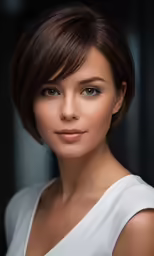 a close up of a person wearing a white top