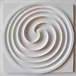 a white art piece on the wall with an intricate pattern