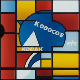 the logo of kodak oil is visible in a stained glass window