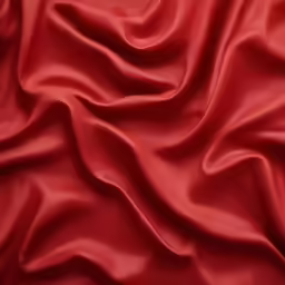 a close up view of red silk