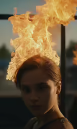 the woman has many fire on her head