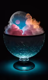 an illuminated bowl with white and red clouds floating in it