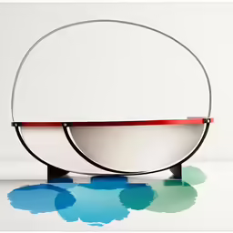 a white bowl with red rim on a stand on a white table