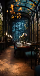 a dining area with tables and chairs in the dark