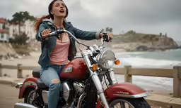 a woman riding a motorcycle at the beach