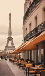 an outdoor cafe with a view of the eiffel tower in paris