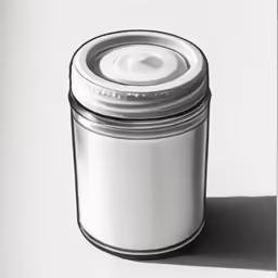 the black and white photograph shows the lid on a container